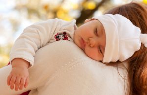 Baby asleep on shoulder